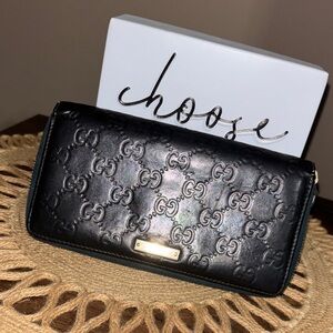 Gucci Black Embossed Leather Wallet
